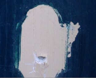 Close-up of the screw hole.