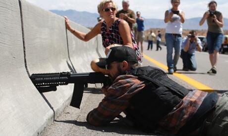A peaceful protester takes aim at BLM agents