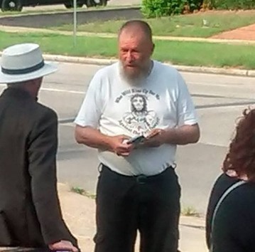 Jim Brockhoeft on the sidewalk outside the clinic