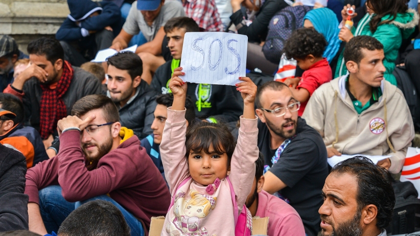 This is a handful of Syrian refugees. Still not Skittles.