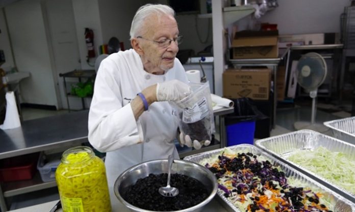 homeless advocate feeds the homeless