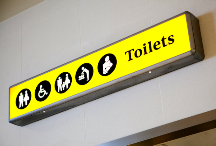 Bathroom sign at airport