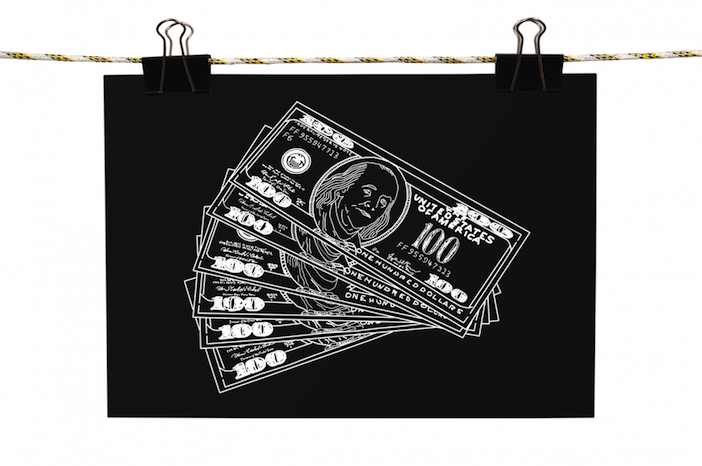image of money on a blackboard