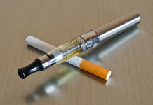 image of cigarette cross with e-cigarette