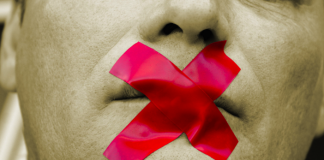image of tape over mouth to silence speech
