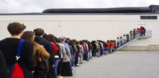 people waiting in line to vote