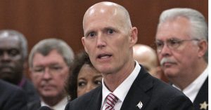 James Rustad Sings About Rick Scott (Florida Governor) In “Bye Bye, You Shiny-Headed Bald Guy”