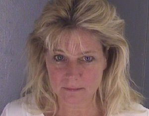Wife of Trump Ethics Adviser Busted in Back Seat Boff with Inmate